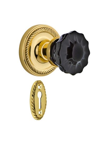 Rope Rosette Mortise Lock Set with Colored Fluted Crystal Glass Knobs Black in Un-Lacquered Brass.